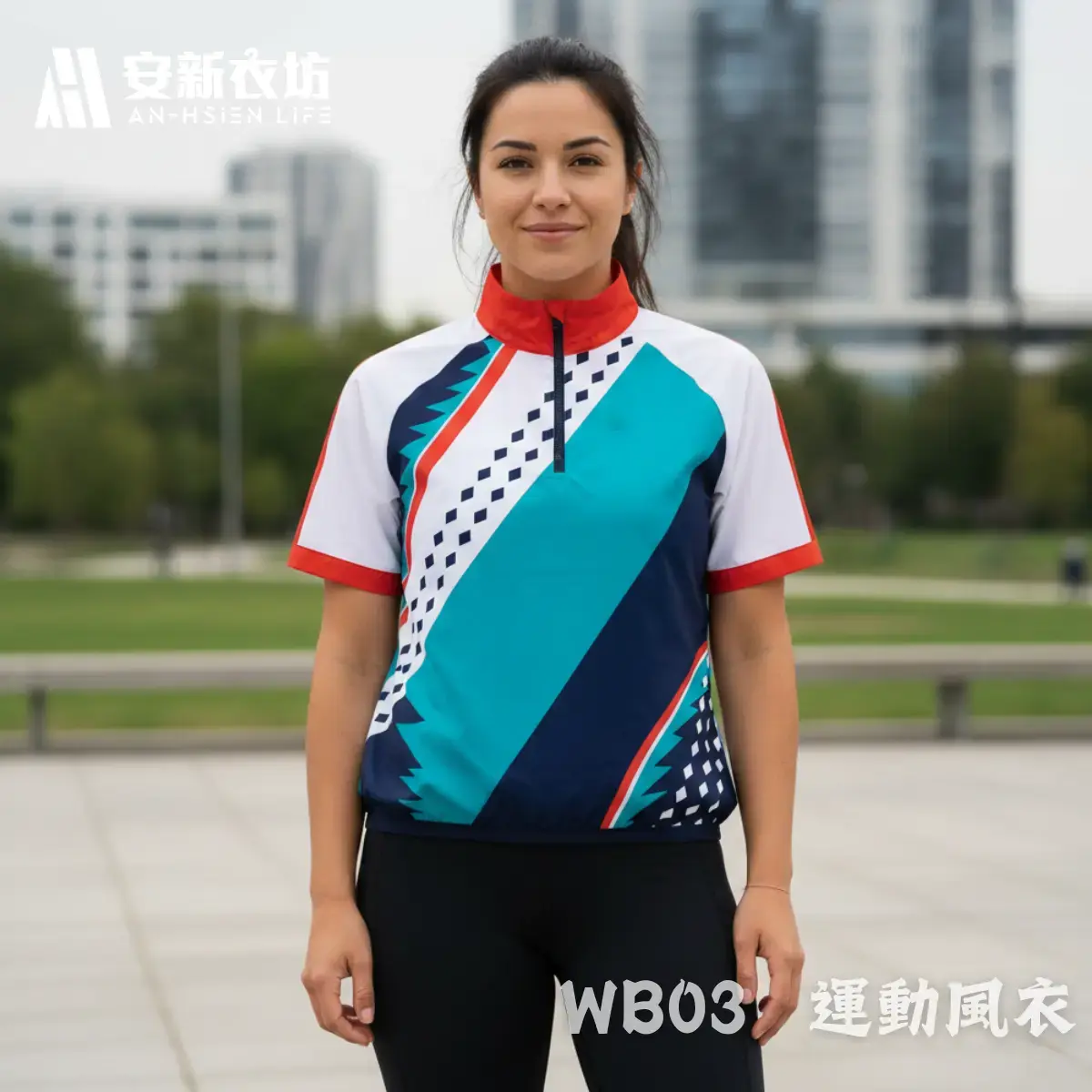 安新衣坊WB03運動風衣女版專業正面實穿照。女模特兒站立於現代都會廣場，展示白底搭配藍綠、深藍與橘紅的斜向幾何撞色短袖防風外套。俐落的半拉鍊設計搭配運動緊身褲，完美詮釋女性城市休閒與復古運動風格。
